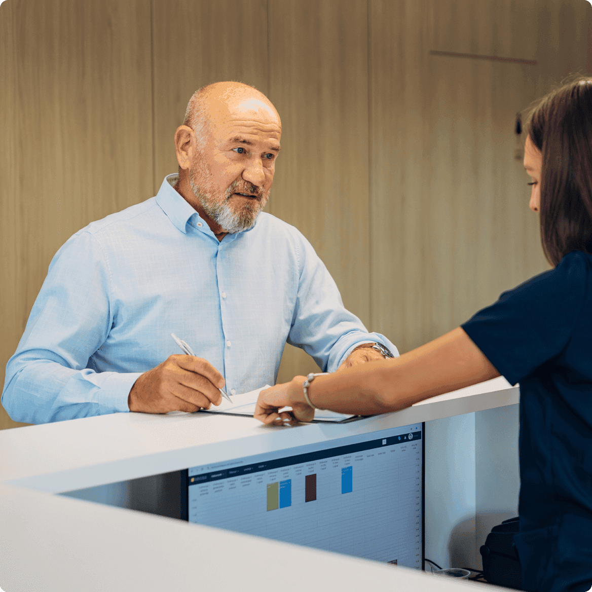 Man at provider counter